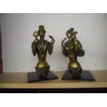 Unusual pair of bronze bookends (reclaimed from the door of a London theatre)