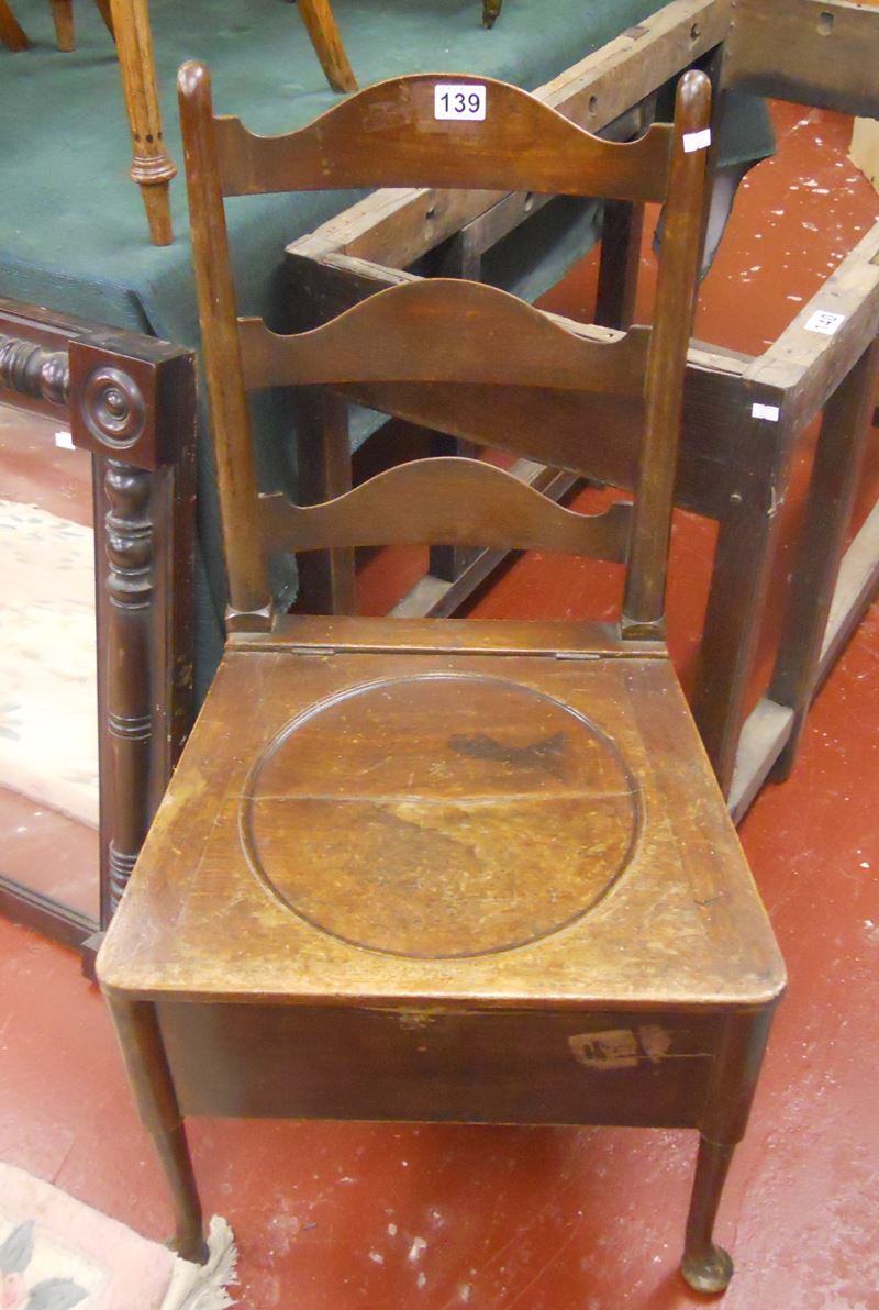 Early mahogany commode chair