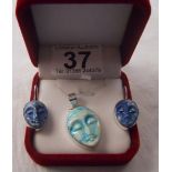 Silver pendant on chain & earrings - Carved face motiff