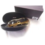 Pair of boxed Prada sunglasses