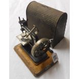 Child's antique sewing machine