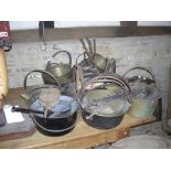 Large collection of brass jam pans, cooking pots etc