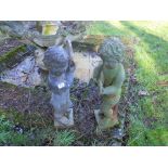 Pair of iron cherub figures