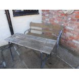 Iron and wood table with bench