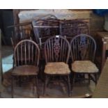 Large collection of wheel-back and spindle back chairs