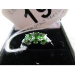 White gold green garnet and diamond set ring - Estimate £70 to £120