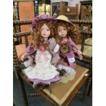 2 china headed dolls