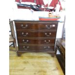 Serpentine front mahogany chest of 4 drawers