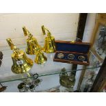 4 brass reproduction ship's bells & a boxed nautical compass set