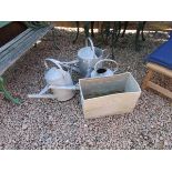 3 galvanised watering cans & Walls ice cream ice tub