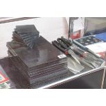 Granite place mats and various chefs knives etc