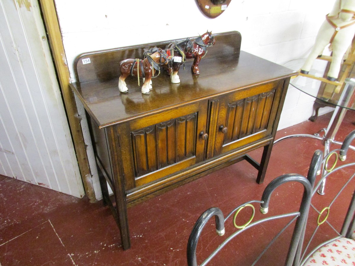 Oak linen-fold sideboard