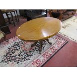 Walnut and inlaid oval breakfast table