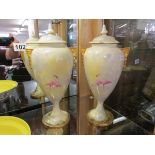 Pair of Royal Worcester urns with covers by G Johnson A/F