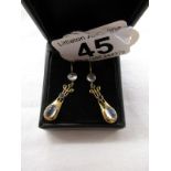 Pair of 15ct moonstone drop earrings - Estimate £120- £160