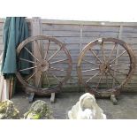 Pair of mounted wagon wheels