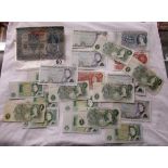 Collection of bank notes to include 10 shilling notes, £5 notes & Tausend Kronen note