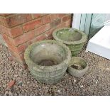 Pair of circular stone planters & 1 small planter