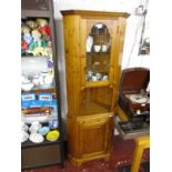 Pine glazed top corner cabinet