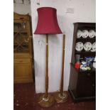 2 wooden standard lamps, one with shade