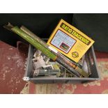 Box of model train accessories