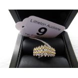 Gold tripple row diamond set ring - Estimate £250 to £350