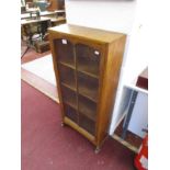 Small oak glazed bookcase