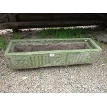 Oblong stone trough