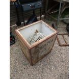 Old Indian tea box with garden containers and baskets