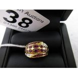 18ct gold ruby and diamond ring - Estimate £320 - £450