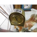 Small brass French alarm clock with Lion motif