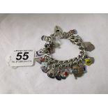 Silver charm bracelet with many charms - approx 77g