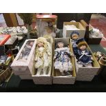 Collection of boxed porcelain faced dolls