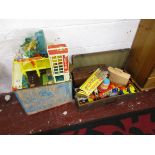 Boxed Fisher Price garage and suitcase of vintage toys