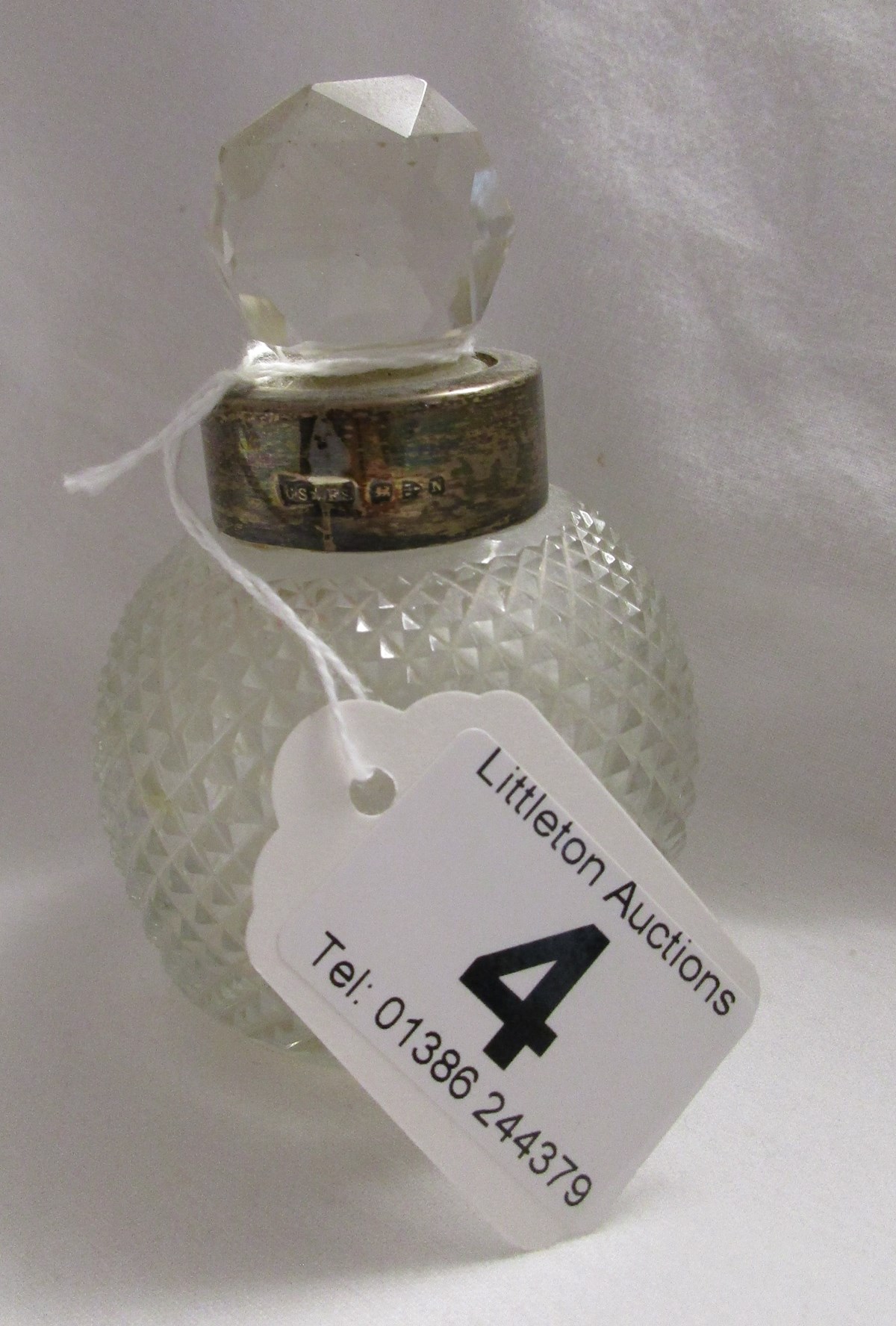 Silver collared glass perfume bottles