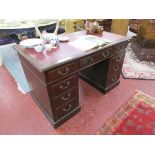 Mahogany pedestal and leather top desk