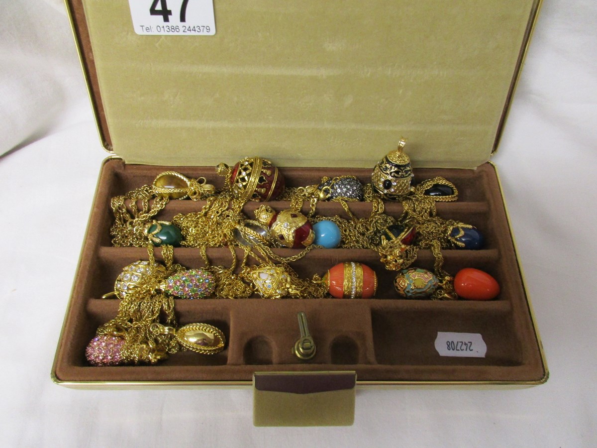 Box of Joan Rivers egg pendants