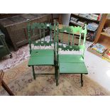 Pair of painted folding green chairs