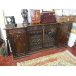 Large carved heavy mahogany bookcase with Harrods label verso - Estimate £90 - £150