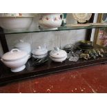 Shelf of china, glass and brass