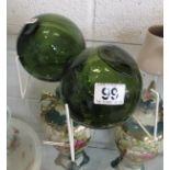 Pair of green glass floats