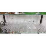 Shelf of cut glass drinking glasses
