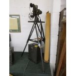 Vintage projector (Bell & Howell) on stand with accessories