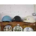 3 military tin helmets