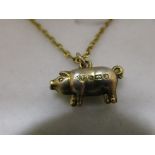 Antique silver pig charm on chain