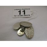 Heavy pair of silver engraved cufflinks