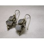 Silver and stone set earrings