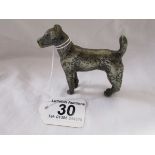 Small white metal dog figure