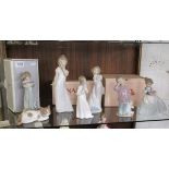 Shelf of Lladro & Nao figures etc