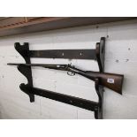 Antique double barrel shotgun with decommission certificate